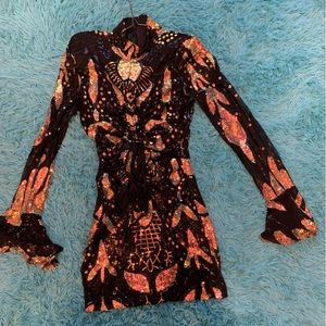 Black and metallic sequin dress